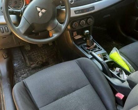 Черный Мицубиси Лансер, объемом двигателя 1.5 л и пробегом 240 тыс. км за 6900 $, фото 1 на Automoto.ua