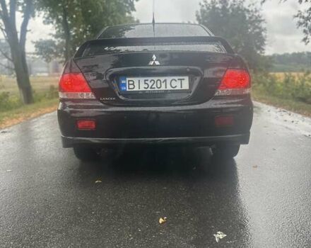 Чорний Міцубісі Lancer, об'ємом двигуна 1.6 л та пробігом 310 тис. км за 5100 $, фото 26 на Automoto.ua
