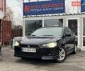 Чорний Міцубісі Lancer, об'ємом двигуна 2 л та пробігом 220 тис. км за 5000 $, фото 1 на Automoto.ua