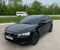 Чорний Міцубісі Lancer, об'ємом двигуна 2 л та пробігом 270 тис. км за 7000 $, фото 3 на Automoto.ua