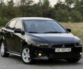 Чорний Міцубісі Lancer, об'ємом двигуна 2 л та пробігом 320 тис. км за 5828 $, фото 1 на Automoto.ua