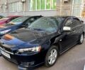 Чорний Міцубісі Lancer, об'ємом двигуна 2 л та пробігом 1 тис. км за 6600 $, фото 1 на Automoto.ua