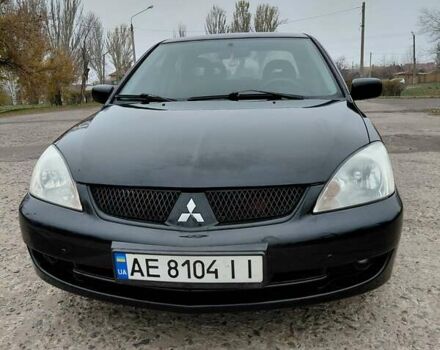 Чорний Міцубісі Lancer, об'ємом двигуна 1.58 л та пробігом 201 тис. км за 4500 $, фото 4 на Automoto.ua