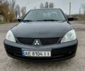 Чорний Міцубісі Lancer, об'ємом двигуна 1.58 л та пробігом 201 тис. км за 4500 $, фото 4 на Automoto.ua