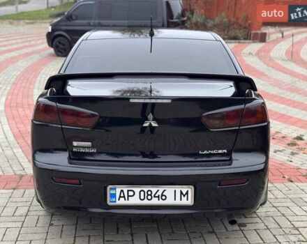 Черный Мицубиси Лансер, объемом двигателя 2 л и пробегом 217 тыс. км за 5500 $, фото 6 на Automoto.ua