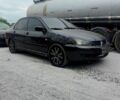 Чорний Міцубісі Lancer, об'ємом двигуна 2 л та пробігом 200 тис. км за 1800 $, фото 5 на Automoto.ua