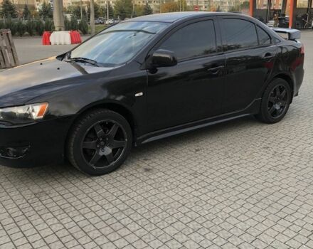 Чорний Міцубісі Lancer, об'ємом двигуна 2 л та пробігом 194 тис. км за 5950 $, фото 6 на Automoto.ua