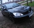 Чорний Міцубісі Lancer, об'ємом двигуна 1.6 л та пробігом 259 тис. км за 4500 $, фото 1 на Automoto.ua