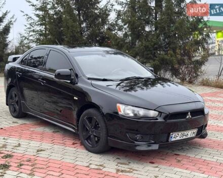 Черный Мицубиси Лансер, объемом двигателя 2 л и пробегом 217 тыс. км за 5500 $, фото 2 на Automoto.ua