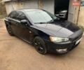 Чорний Міцубісі Lancer, об'ємом двигуна 2 л та пробігом 216 тис. км за 6200 $, фото 4 на Automoto.ua