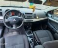 Чорний Міцубісі Lancer, об'ємом двигуна 1.5 л та пробігом 283 тис. км за 4500 $, фото 12 на Automoto.ua