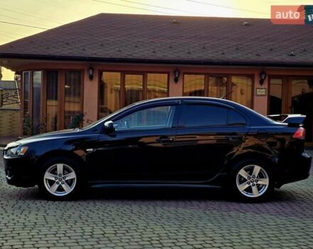 Чорний Міцубісі Lancer, об'ємом двигуна 2 л та пробігом 260 тис. км за 6555 $, фото 16 на Automoto.ua