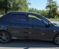 Чорний Міцубісі Lancer, об'ємом двигуна 2 л та пробігом 161 тис. км за 5000 $, фото 2 на Automoto.ua