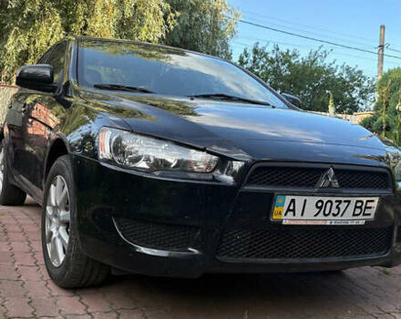 Черный Мицубиси Лансер, объемом двигателя 1.5 л и пробегом 111 тыс. км за 7500 $, фото 7 на Automoto.ua
