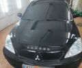 Чорний Міцубісі Lancer, об'ємом двигуна 1.6 л та пробігом 165 тис. км за 6000 $, фото 1 на Automoto.ua