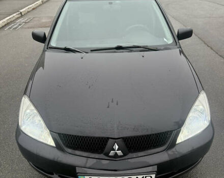 Чорний Міцубісі Lancer, об'ємом двигуна 1.58 л та пробігом 256 тис. км за 3700 $, фото 8 на Automoto.ua