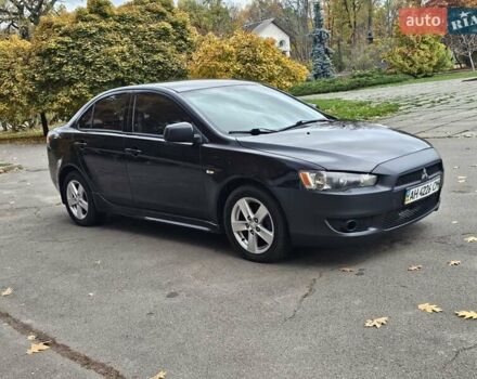 Міцубісі Lancer 2007 у Києві на Automoto.ua Чорний Міцубісі Lancer, об'ємом двигуна 2 л та пробігом 115 тис. км за 5000 $, фото 6 на Automoto.ua