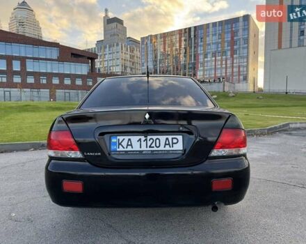 Черный Мицубиси Лансер, объемом двигателя 1.58 л и пробегом 237 тыс. км за 3950 $, фото 6 на Automoto.ua