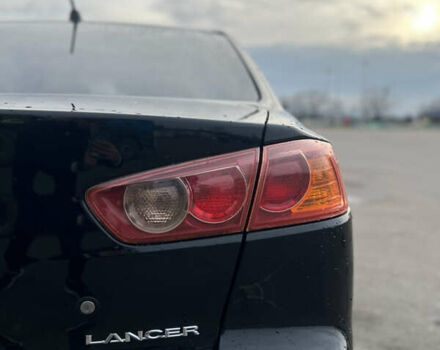 Чорний Міцубісі Lancer, об'ємом двигуна 1.5 л та пробігом 209 тис. км за 5500 $, фото 12 на Automoto.ua
