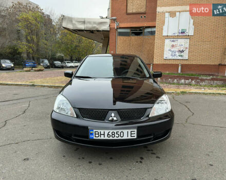 Чорний Міцубісі Lancer, об'ємом двигуна 1.58 л та пробігом 173 тис. км за 4700 $, фото 7 на Automoto.ua