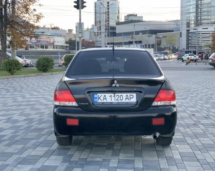 Черный Мицубиси Лансер, объемом двигателя 1.6 л и пробегом 237 тыс. км за 4300 $, фото 6 на Automoto.ua