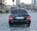 Черный Мицубиси Лансер, объемом двигателя 1.6 л и пробегом 237 тыс. км за 4300 $, фото 6 на Automoto.ua