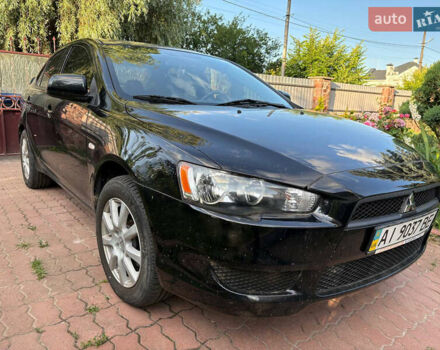 Черный Мицубиси Лансер, объемом двигателя 1.5 л и пробегом 111 тыс. км за 7500 $, фото 2 на Automoto.ua