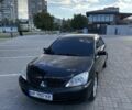 Чорний Міцубісі Lancer, об'ємом двигуна 1.6 л та пробігом 260 тис. км за 4909 $, фото 1 на Automoto.ua