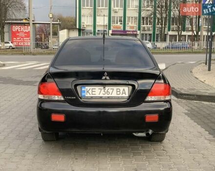 Черный Мицубиси Лансер, объемом двигателя 1.58 л и пробегом 237 тыс. км за 3850 $, фото 4 на Automoto.ua