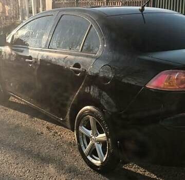 Черный Мицубиси Лансер, объемом двигателя 1.5 л и пробегом 270 тыс. км за 4999 $, фото 5 на Automoto.ua