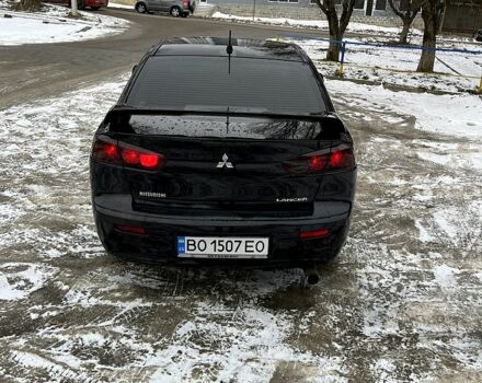 Чорний Міцубісі Lancer, об'ємом двигуна 2 л та пробігом 255 тис. км за 6600 $, фото 5 на Automoto.ua