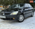 Чорний Міцубісі Lancer, об'ємом двигуна 1.6 л та пробігом 190 тис. км за 3450 $, фото 1 на Automoto.ua