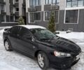 Черный Мицубиси Лансер, объемом двигателя 2 л и пробегом 325 тыс. км за 6500 $, фото 1 на Automoto.ua