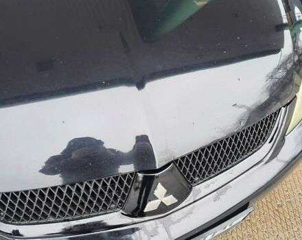 Черный Мицубиси Лансер, объемом двигателя 1.6 л и пробегом 309 тыс. км за 4000 $, фото 10 на Automoto.ua