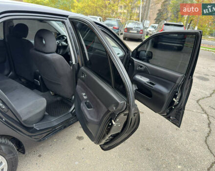 Чорний Міцубісі Lancer, об'ємом двигуна 1.58 л та пробігом 173 тис. км за 4700 $, фото 16 на Automoto.ua