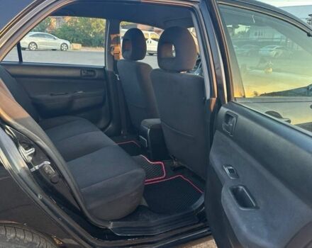 Черный Мицубиси Лансер, объемом двигателя 1.6 л и пробегом 305 тыс. км за 4799 $, фото 7 на Automoto.ua