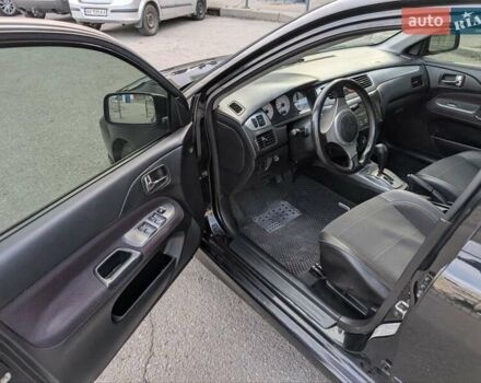 Чорний Міцубісі Lancer, об'ємом двигуна 2 л та пробігом 152 тис. км за 5500 $, фото 15 на Automoto.ua
