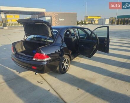 Чорний Міцубісі Lancer, об'ємом двигуна 1.59 л та пробігом 180 тис. км за 4999 $, фото 8 на Automoto.ua