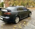 Черный Мицубиси Лансер, объемом двигателя 2 л и пробегом 280 тыс. км за 4600 $, фото 5 на Automoto.ua