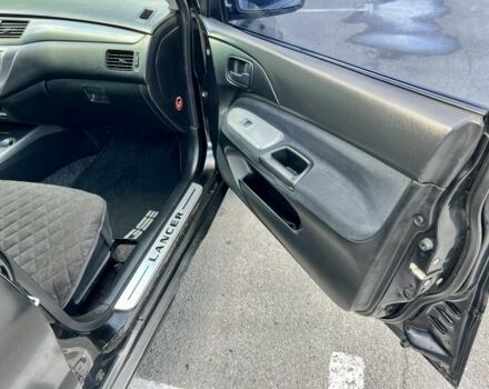 Чорний Міцубісі Lancer, об'ємом двигуна 1.6 л та пробігом 228 тис. км за 3499 $, фото 5 на Automoto.ua