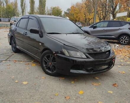 Мицубиси Лансер 2007 в Южноукраинске на Automoto.ua Черный Мицубиси Лансер, объемом двигателя 2 л и пробегом 161 тыс. км за 4600 $, фото 2 на Automoto.ua