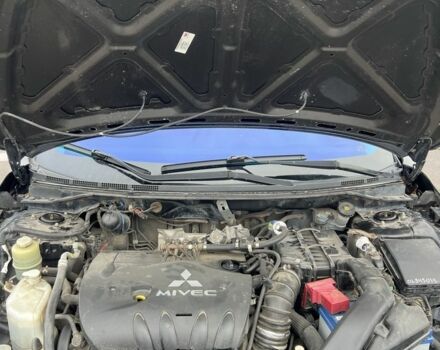 Черный Мицубиси Лансер, объемом двигателя 2 л и пробегом 350 тыс. км за 6700 $, фото 9 на Automoto.ua