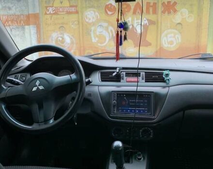 Черный Мицубиси Лансер, объемом двигателя 1.6 л и пробегом 164 тыс. км за 5200 $, фото 8 на Automoto.ua