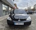 Чорний Міцубісі Lancer, об'ємом двигуна 1.6 л та пробігом 258 тис. км за 4300 $, фото 1 на Automoto.ua