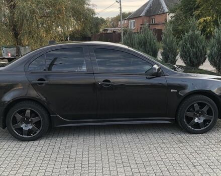 Чорний Міцубісі Lancer, об'ємом двигуна 2 л та пробігом 194 тис. км за 5950 $, фото 2 на Automoto.ua