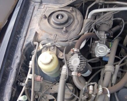 Чорний Міцубісі Lancer, об'ємом двигуна 1.6 л та пробігом 255 тис. км за 5000 $, фото 5 на Automoto.ua