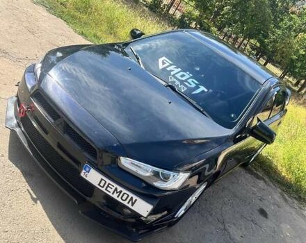 Чорний Міцубісі Lancer, об'ємом двигуна 2 л та пробігом 226 тис. км за 7200 $, фото 13 на Automoto.ua