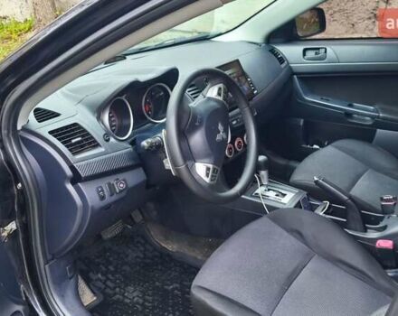 Черный Мицубиси Лансер, объемом двигателя 2 л и пробегом 230 тыс. км за 7100 $, фото 10 на Automoto.ua