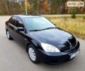 Чорний Міцубісі Lancer, об'ємом двигуна 1.6 л та пробігом 240 тис. км за 4950 $, фото 1 на Automoto.ua