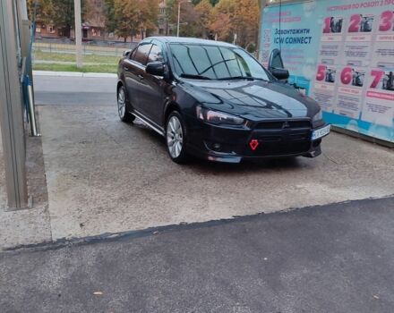 Черный Мицубиси Лансер, объемом двигателя 2 л и пробегом 245 тыс. км за 7500 $, фото 4 на Automoto.ua